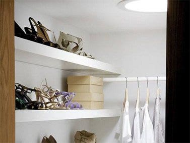 VELUX sun tunnels installed in dark store cupboard